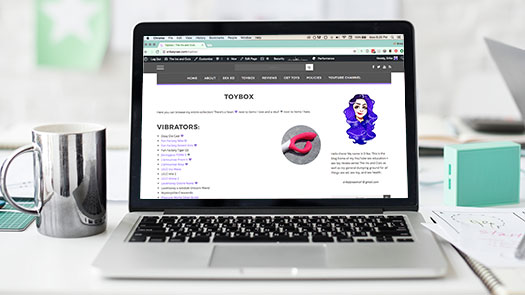 Erika Lynae's website shown on a Macbook laptop